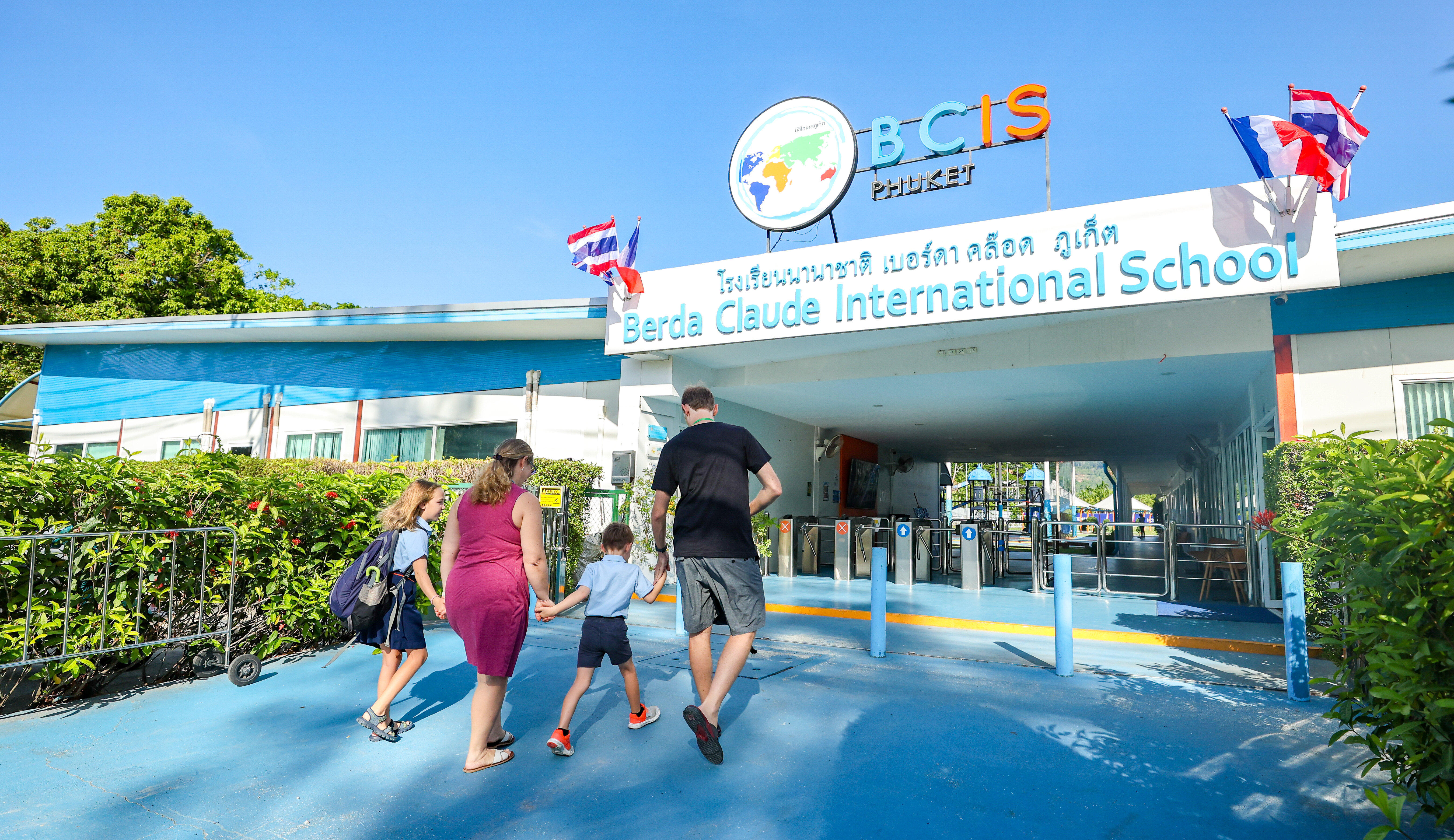 parents and children arriving at the school