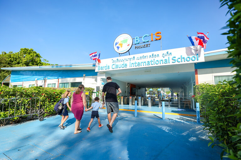 parents and children arriving at the school