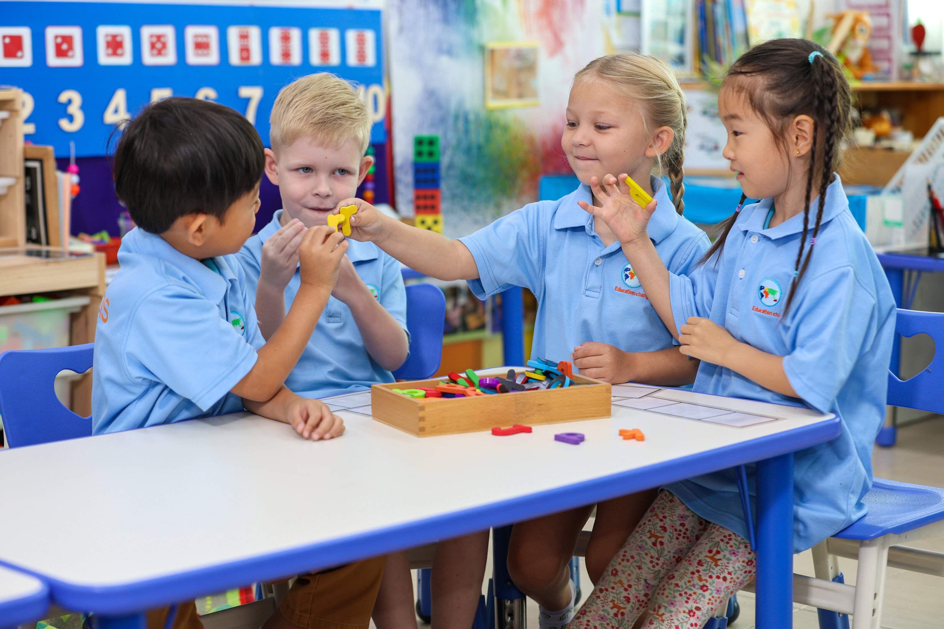 four students playing