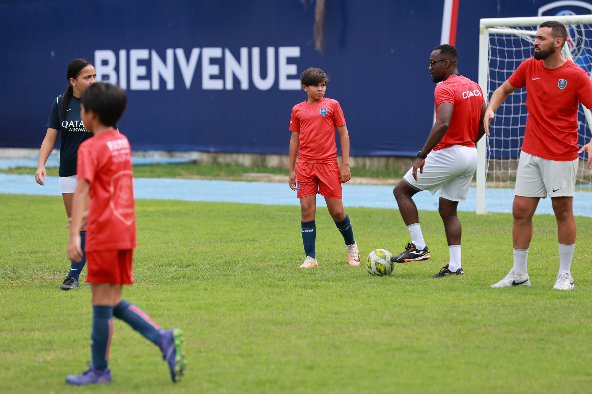 students playing football