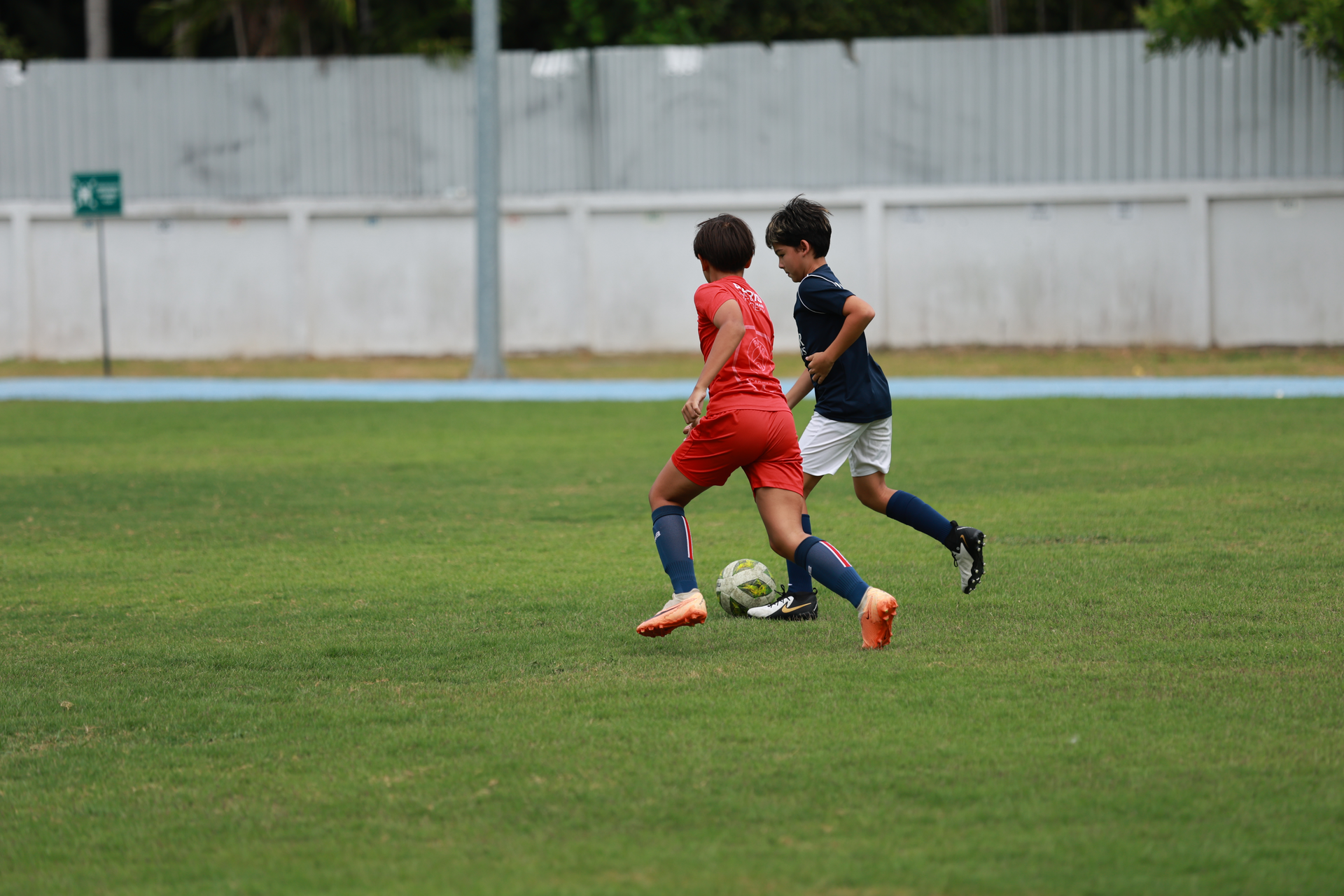 students playing soccer