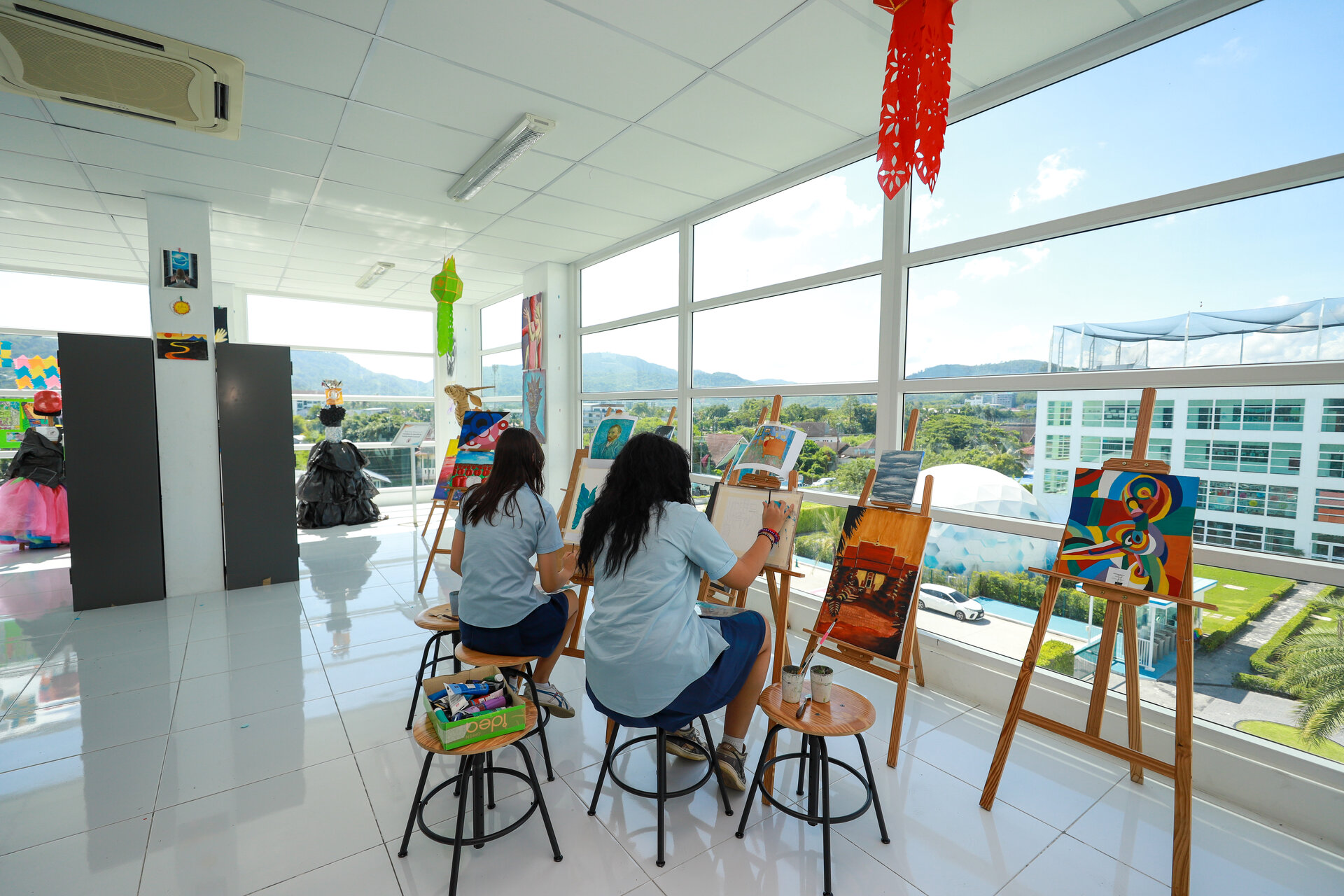 students painting