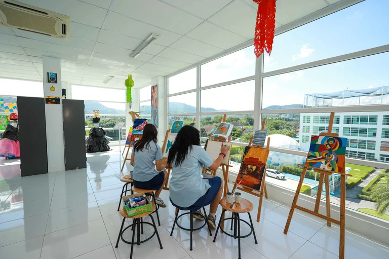 students painting