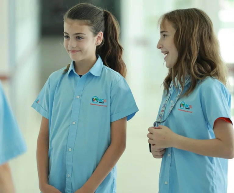two students smiling