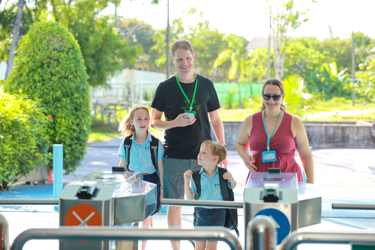 parents and children arriving at the school