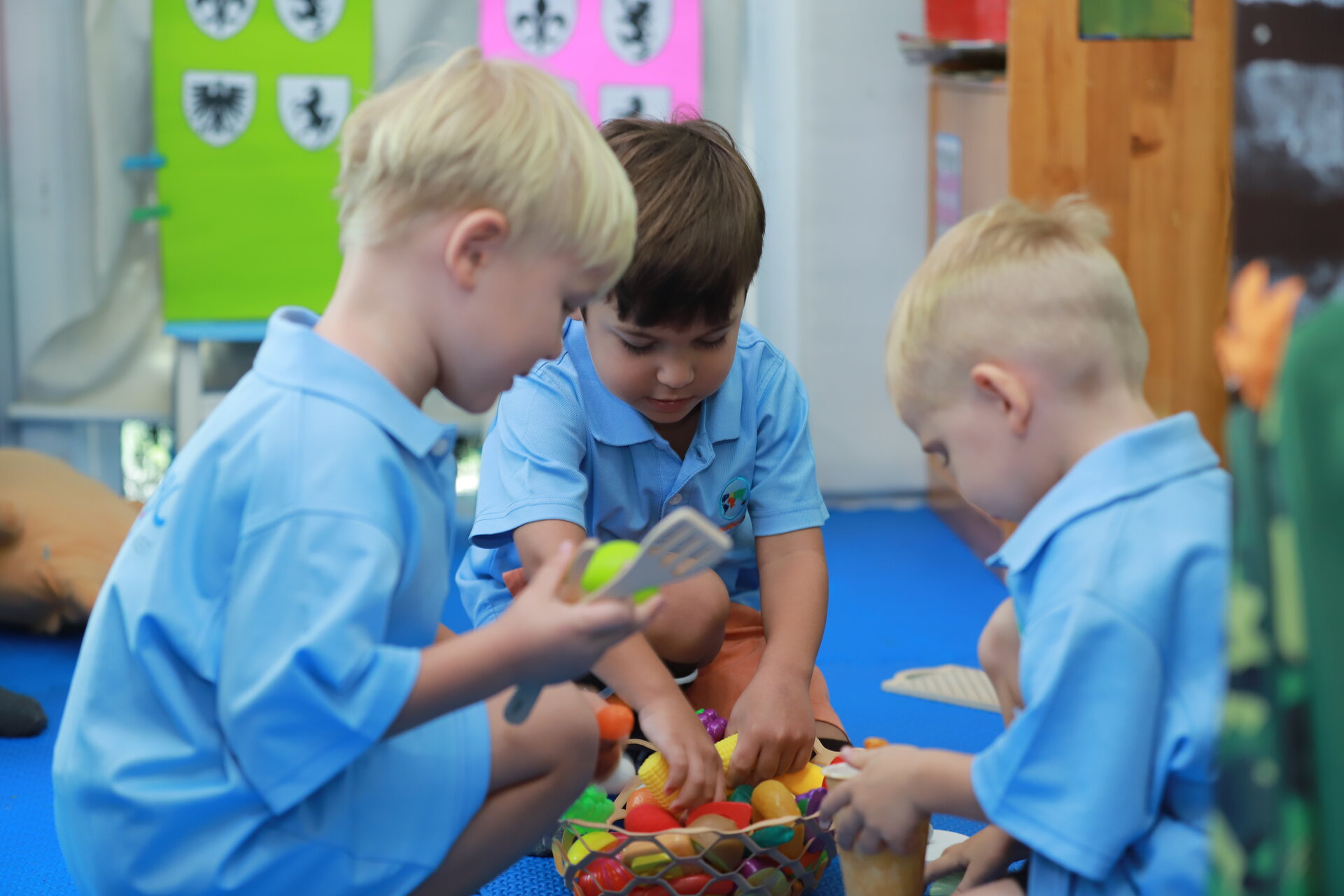 three students playing