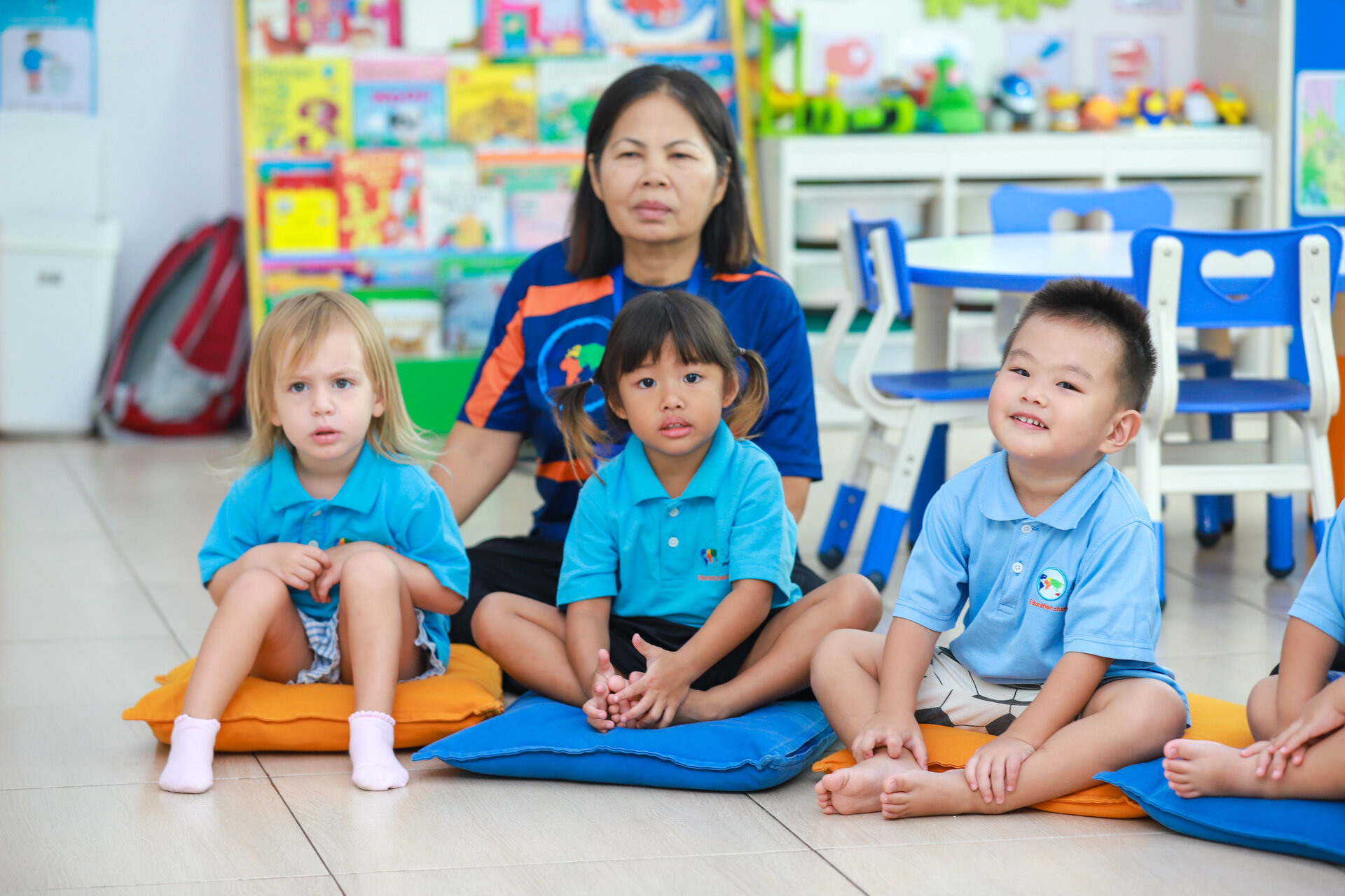 three students and teacher