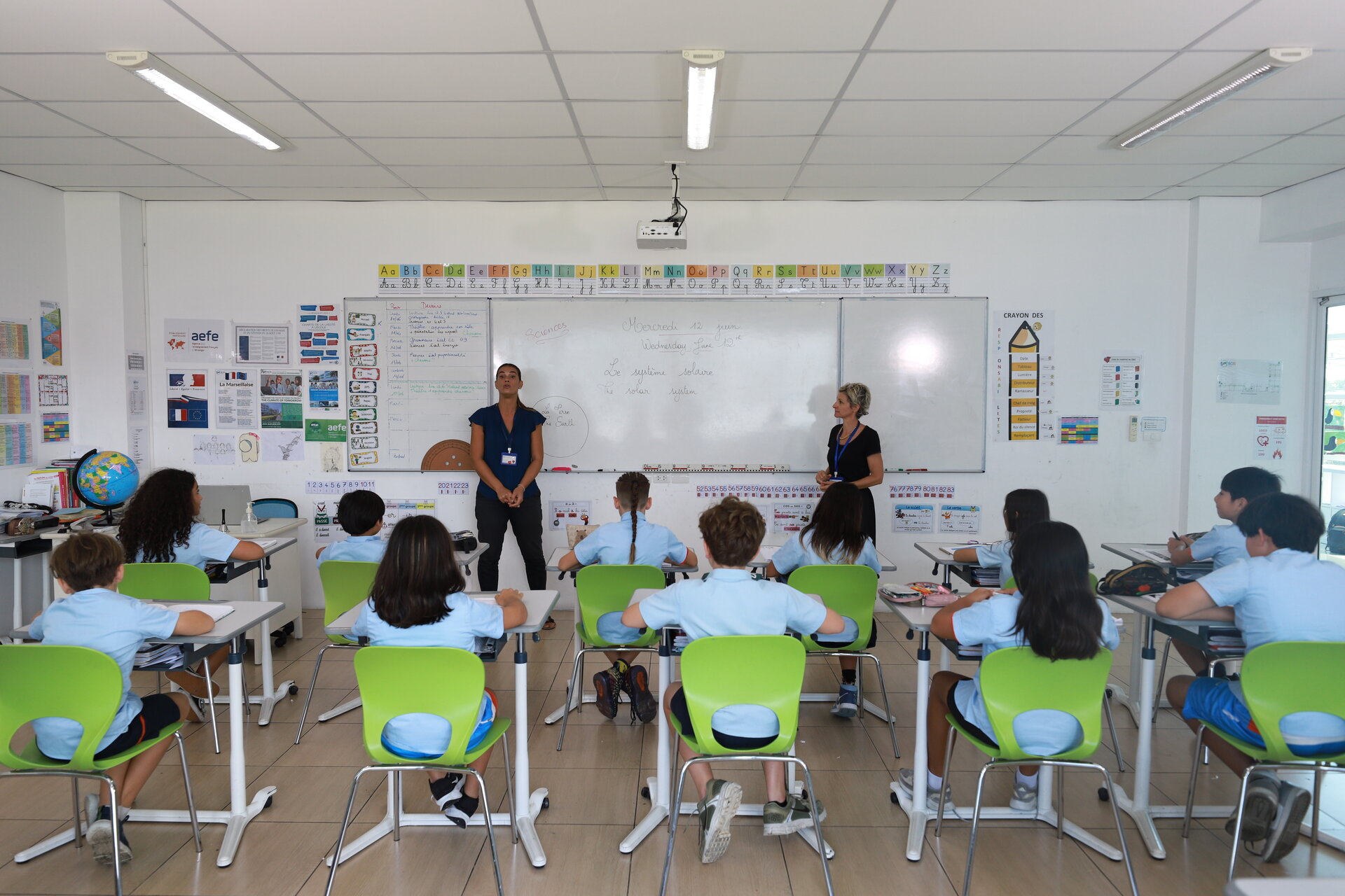 teacher and students in the classroom