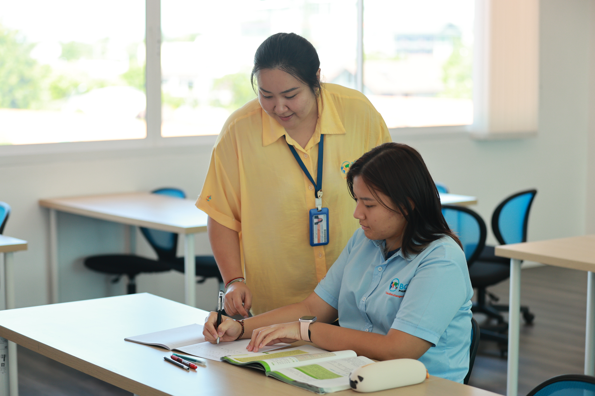 teacher talking to a student