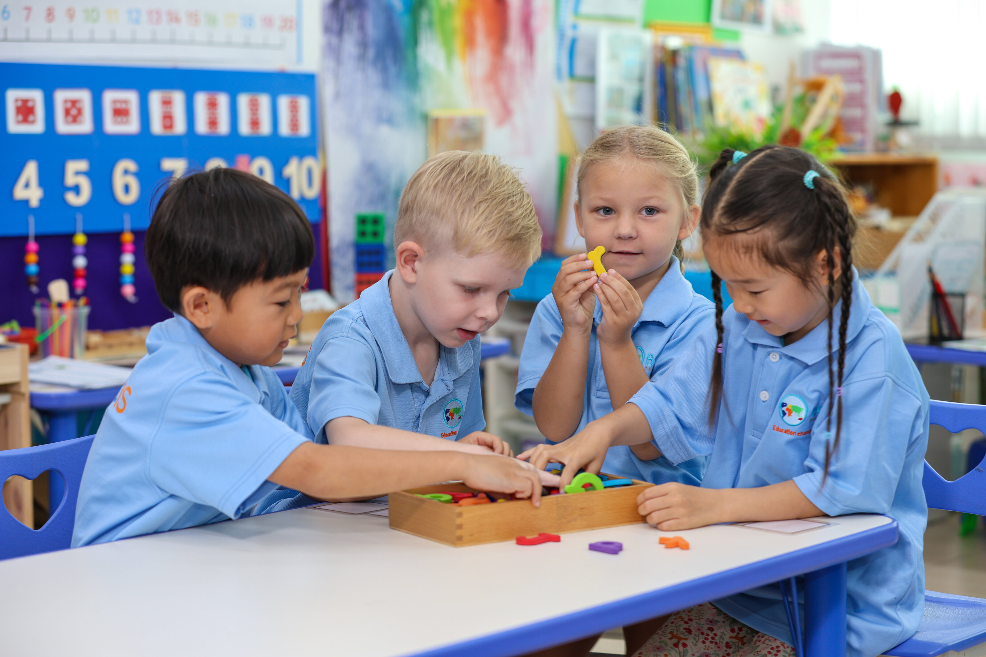 four students playing