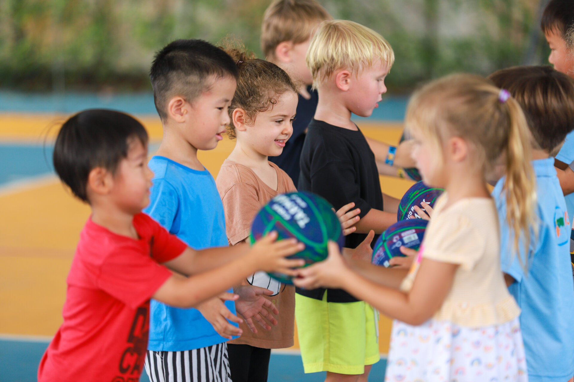 students playing with the balls