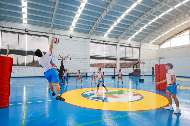 students during volleyball match