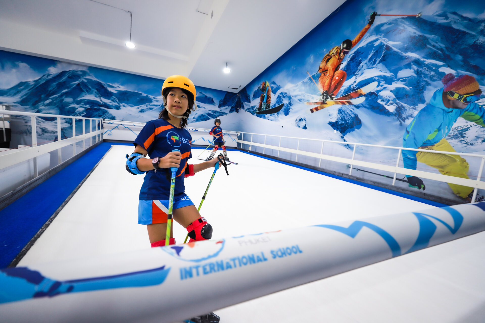 students during indoor ski lesson
