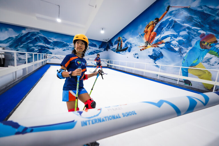 students during indoor ski lesson