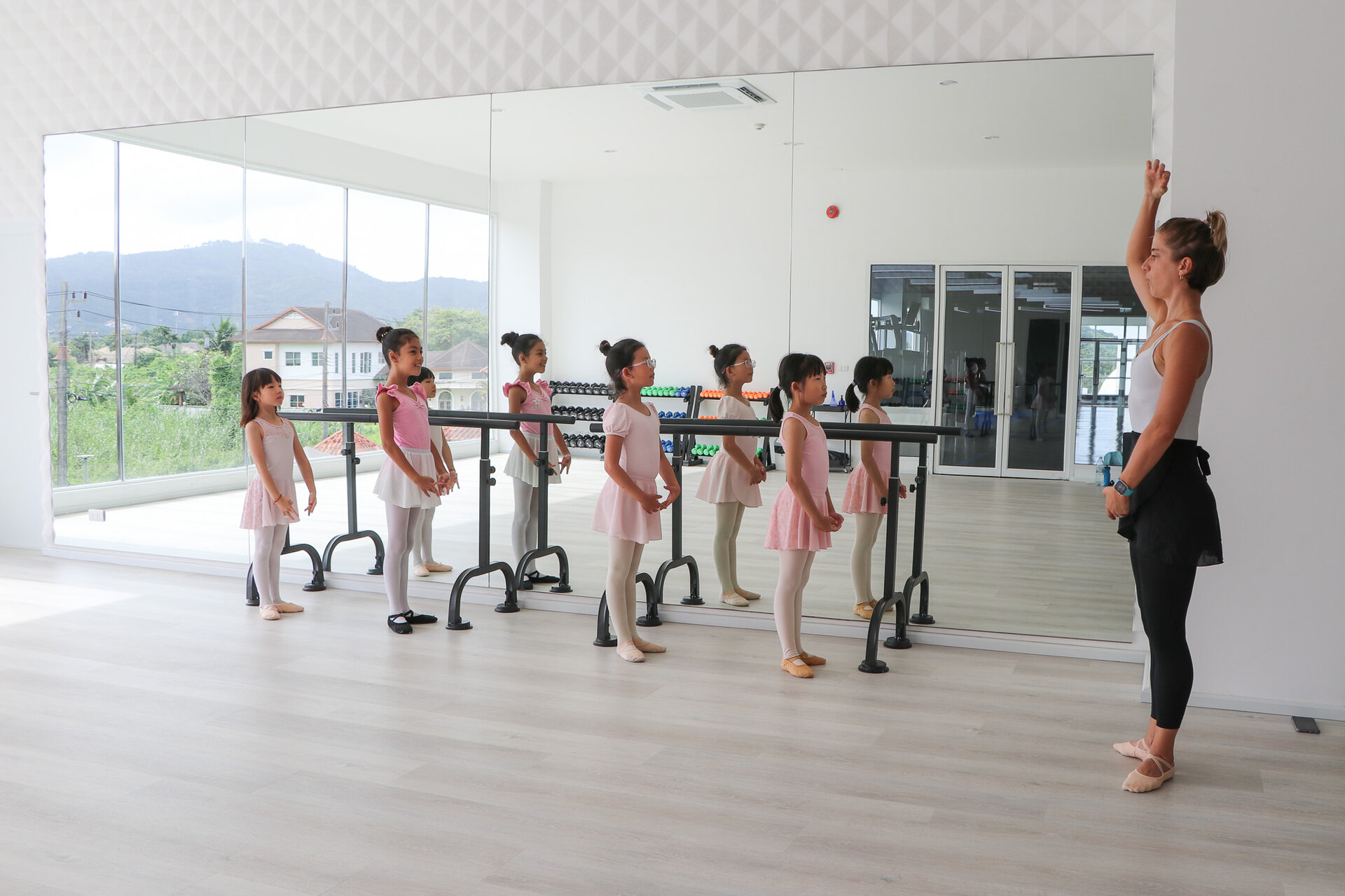 students and teacher during dance class
