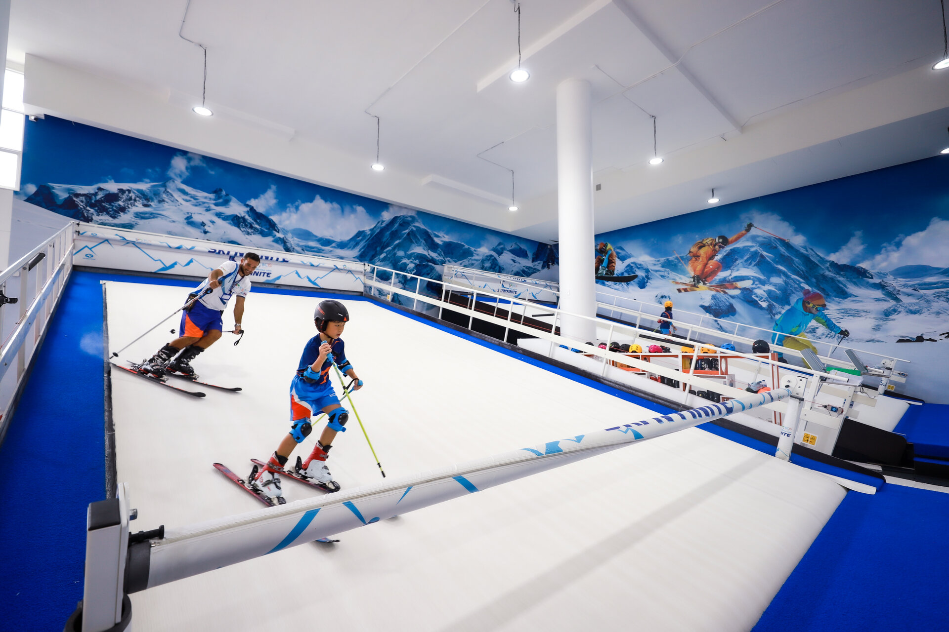 students during indoor ski lesson