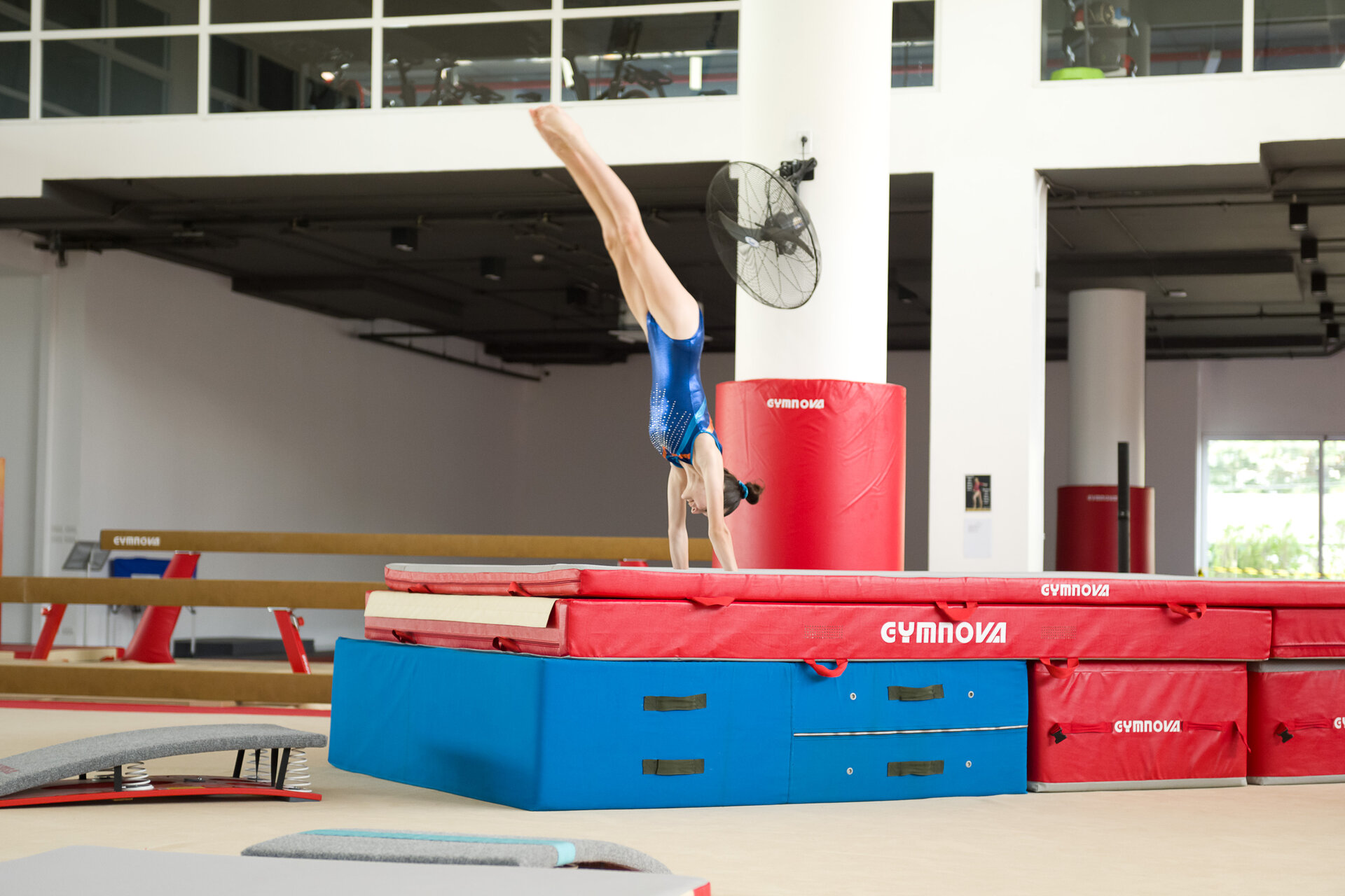 student during artistic gymnastics lesson