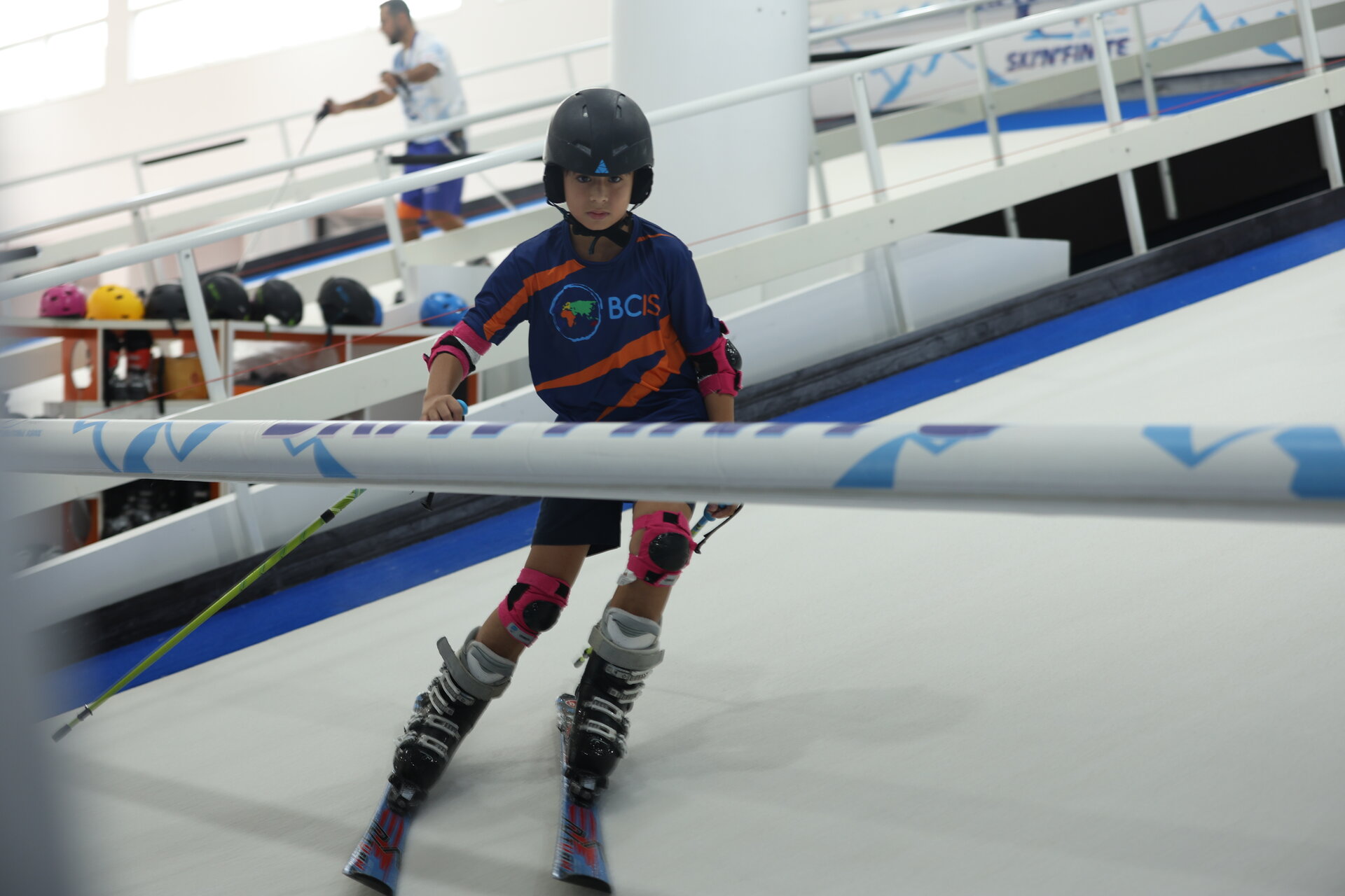 student during indoor ski lesson