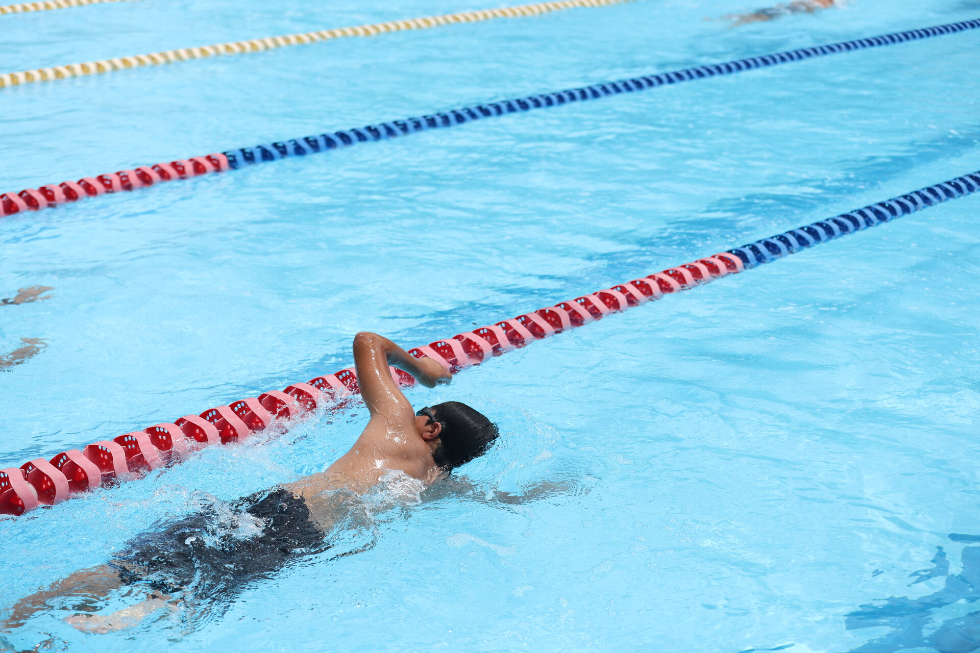 student swimming